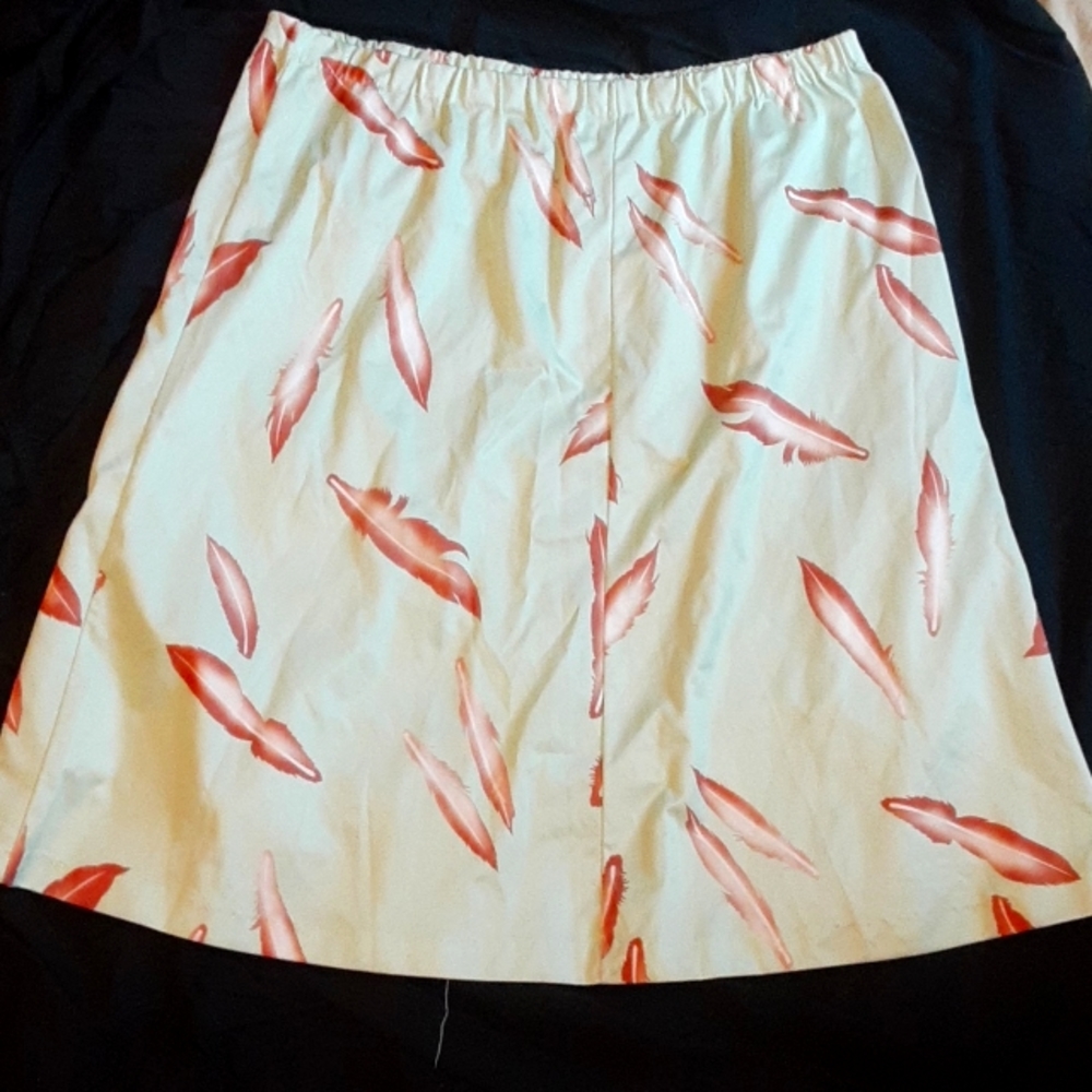 Slip Size 24 1/5, Mint Green and Tan Feathers.